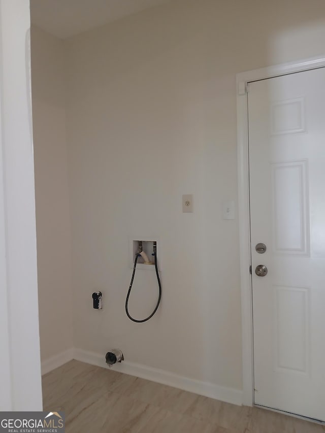 6985 Butner Rd, South Fulton, GA 30349 - laundry area featuring electric dryer hookup and hookup for a washing machine