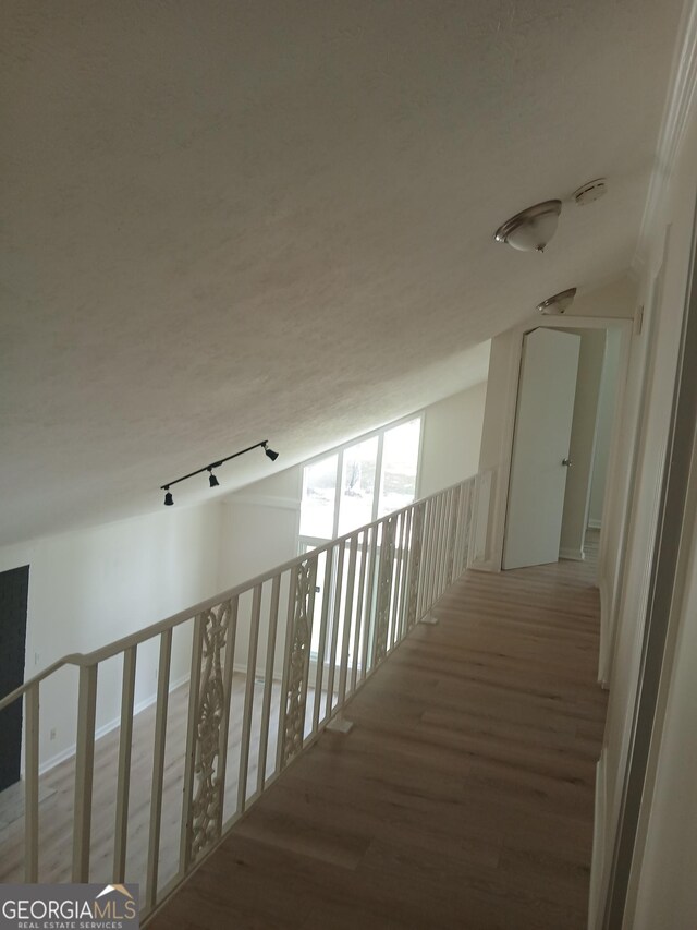 6985 Butner Rd, South Fulton, GA 30349 - corridor featuring wood finished floors