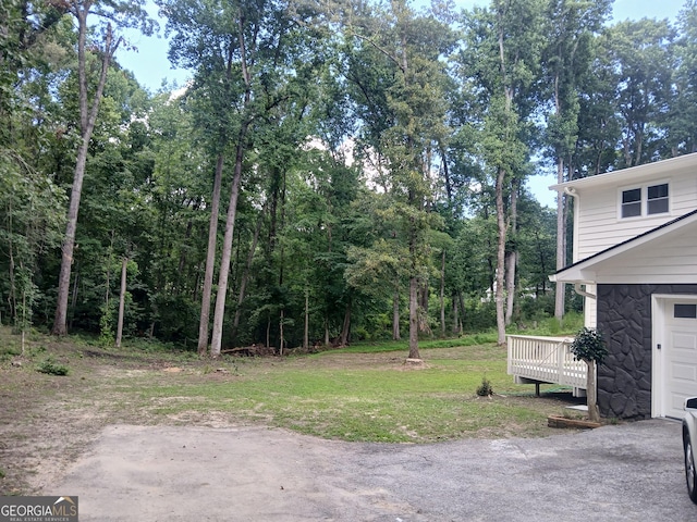 6985 Butner Rd, South Fulton, GA 30349 - view of yard featuring a wooden deck