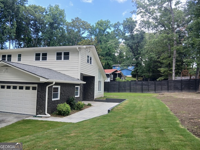 6985 Butner Rd, South Fulton, GA 30349 - view of side of property with stone siding and roof with shingles