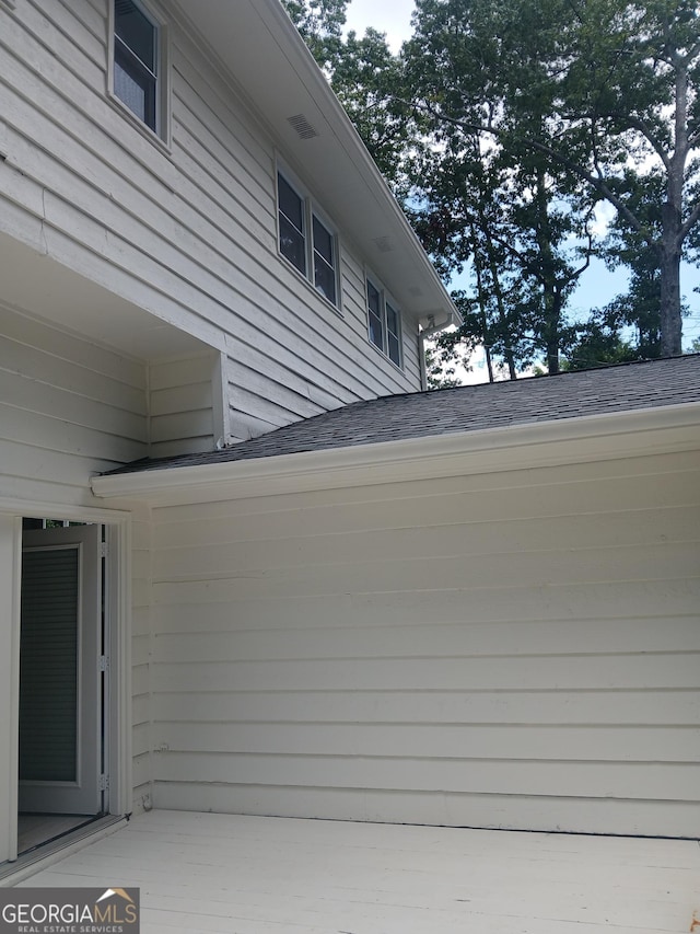 6985 Butner Rd, South Fulton, GA 30349 - view of side of property featuring roof with shingles
