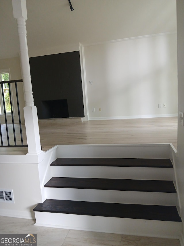 6985 Butner Rd, South Fulton, GA 30349 - stairway with baseboards