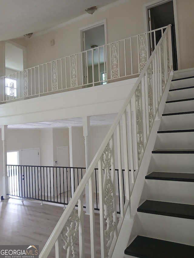 6985 Butner Rd, South Fulton, GA 30349 - stairs featuring a towering ceiling