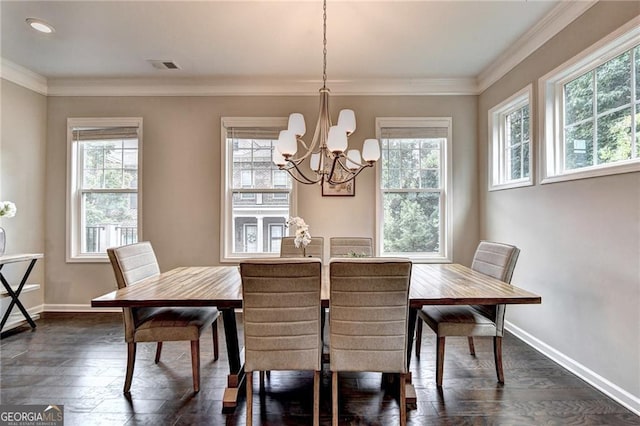 711 Topsail Ln, Alpharetta, GA 30005 - dining area featuring a chandelier, dark wood finished floors, and ornamental molding
