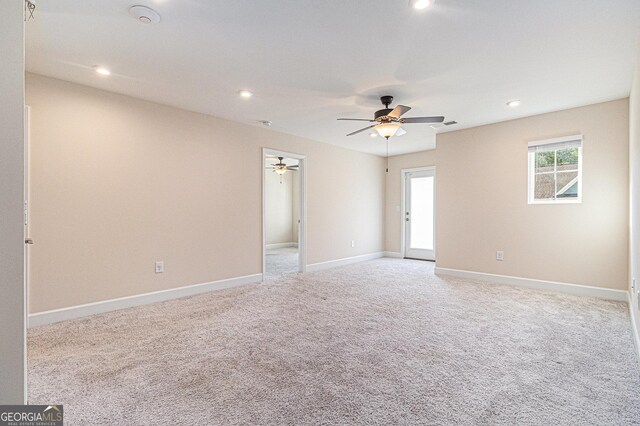 129 Academy Ln, Canton, GA 30114 - spare room featuring light carpet, ceiling fan, recessed lighting, and a smoke detector