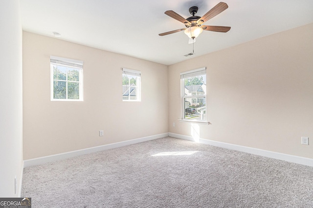 129 Academy Ln, Canton, GA 30114 - empty room featuring healthy amount of natural light, carpet, and ceiling fan