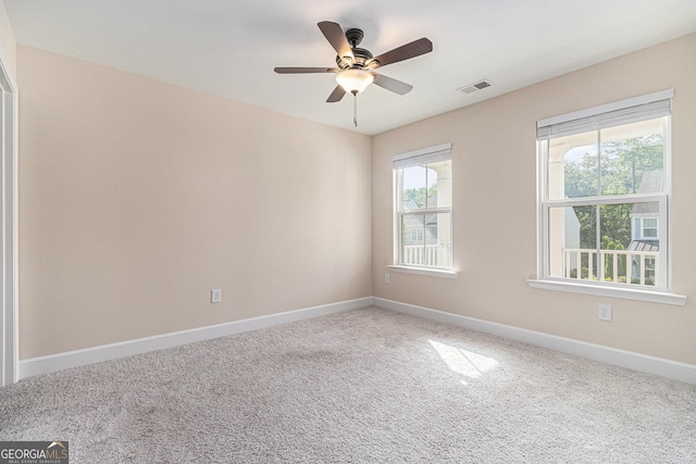 129 Academy Ln, Canton, GA 30114 - carpeted empty room featuring baseboards and a ceiling fan