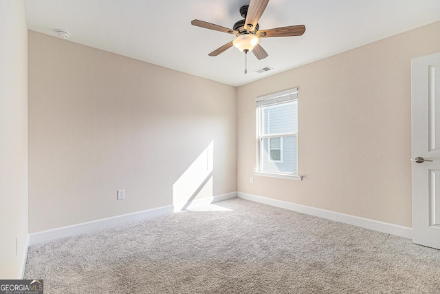 129 Academy Ln, Canton, GA 30114 - carpeted empty room with a smoke detector and a ceiling fan