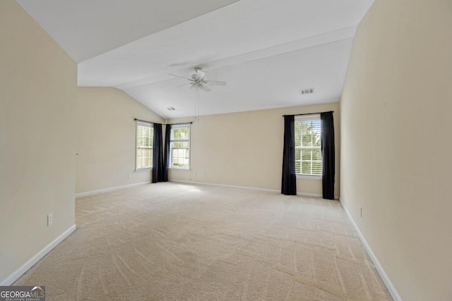 773 Van Briggle Path, Sugar Hill, GA 30518 - empty room with lofted ceiling, ceiling fan, and light colored carpet