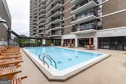 620 NE Peachtree St Unit 901, Atlanta, GA 30308 - community pool with a patio