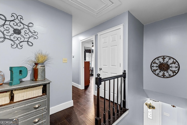 435 Hampton Grn, Peachtree City, GA 30269 - corridor featuring an upstairs landing and dark wood-type flooring