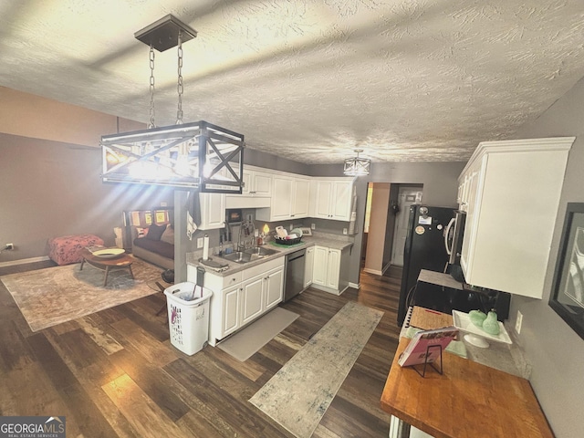 214 Sugar Hill Ct, Jackson, GA 30233 - kitchen featuring dishwasher, dark wood finished floors, white cabinets, and a textured ceiling