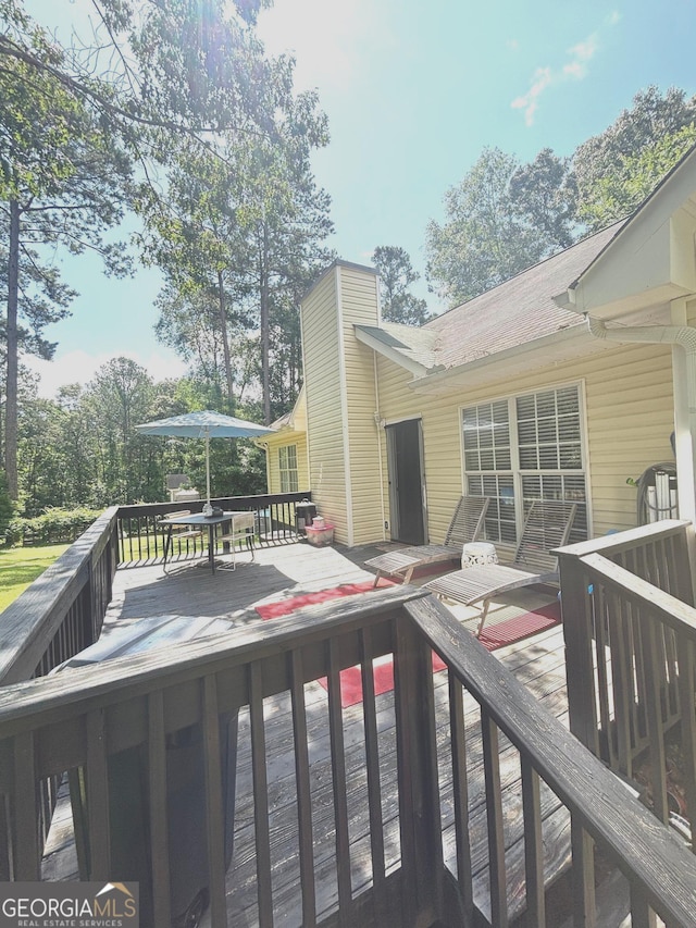 214 Sugar Hill Ct, Jackson, GA 30233 - wooden deck with outdoor dining area