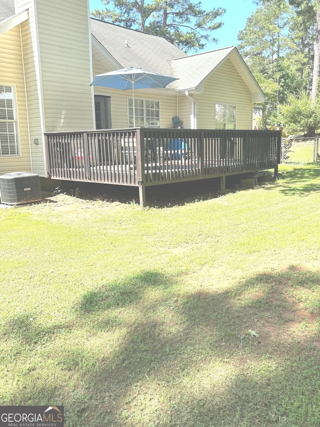 214 Sugar Hill Ct, Jackson, GA 30233 - rear view of property with a deck and a lawn