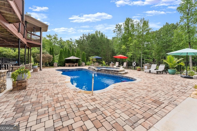 1572 Azalea Dr, Lawrenceville, GA 30043 - view of swimming pool with a patio area and a pool with connected hot tub