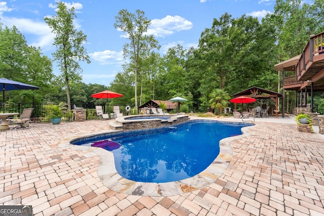 1572 Azalea Dr, Lawrenceville, GA 30043 - view of pool with a patio area, outdoor dining space, a pool with connected hot tub, a gazebo, and view of scattered trees