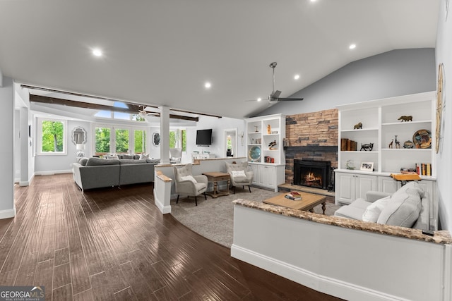 1572 Azalea Dr, Lawrenceville, GA 30043 - living room with ceiling fan, vaulted ceiling, a stone fireplace, recessed lighting, and dark wood-style floors