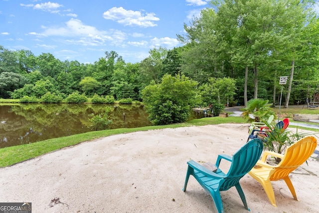 1572 Azalea Dr, Lawrenceville, GA 30043 - view of patio / terrace featuring a water view