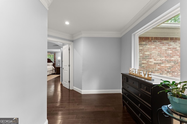 1572 Azalea Dr, Lawrenceville, GA 30043 - hallway with hardwood / wood-style floors, arched walkways, recessed lighting, and crown molding