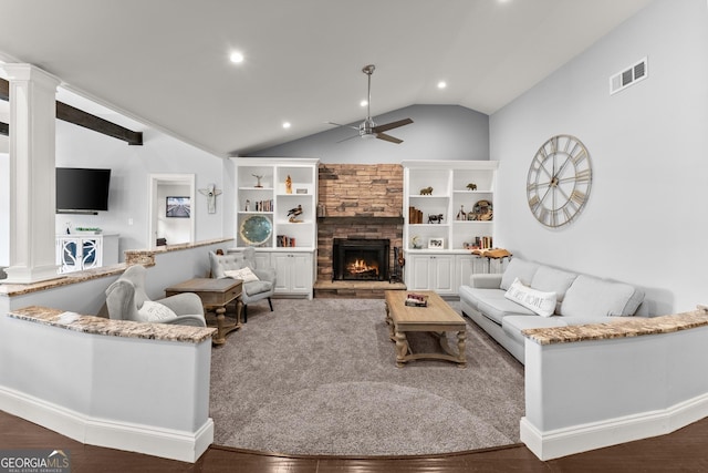 1572 Azalea Dr, Lawrenceville, GA 30043 - living room with a stone fireplace, lofted ceiling, ceiling fan, decorative columns, and recessed lighting