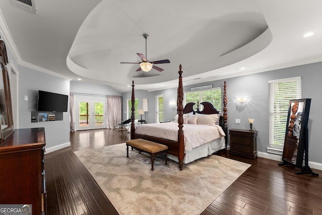 1572 Azalea Dr, Lawrenceville, GA 30043 - bedroom with a raised ceiling, recessed lighting, french doors, dark wood-style flooring, and crown molding