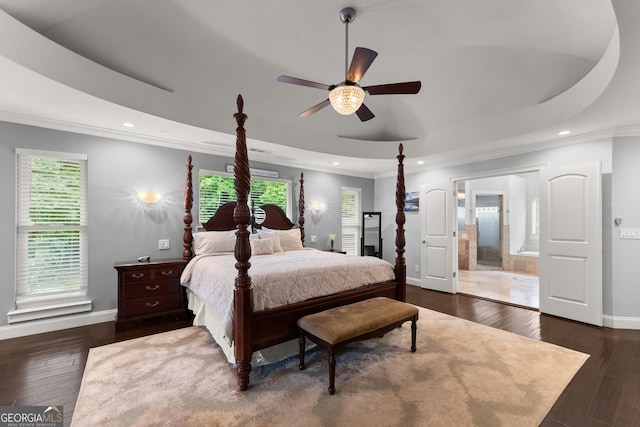1572 Azalea Dr, Lawrenceville, GA 30043 - bedroom with ornamental molding, recessed lighting, dark wood-type flooring, ensuite bathroom, and a tray ceiling
