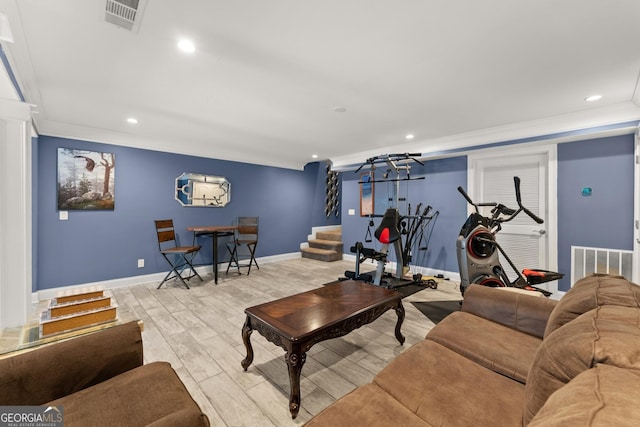 1572 Azalea Dr, Lawrenceville, GA 30043 - living room with light wood-style floors, recessed lighting, ornamental molding, and stairway