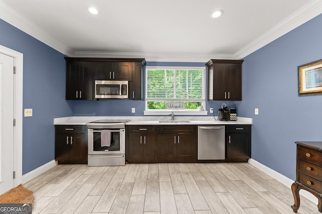 1572 Azalea Dr, Lawrenceville, GA 30043 - kitchen featuring stainless steel appliances, light countertops, light wood-style floors, crown molding, and dark brown cabinets