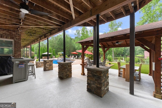1572 Azalea Dr, Lawrenceville, GA 30043 - view of patio / terrace featuring ceiling fan, a gazebo, and outdoor dining area