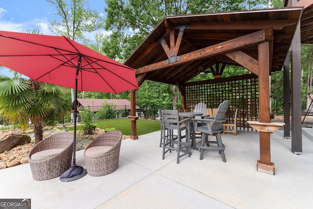 1572 Azalea Dr, Lawrenceville, GA 30043 - view of patio / terrace with a gazebo and outdoor dining space