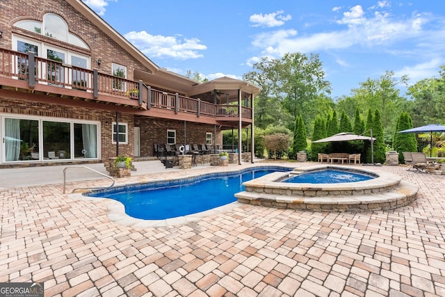 1572 Azalea Dr, Lawrenceville, GA 30043 - view of swimming pool featuring a patio area, outdoor dining area, and a pool with connected hot tub