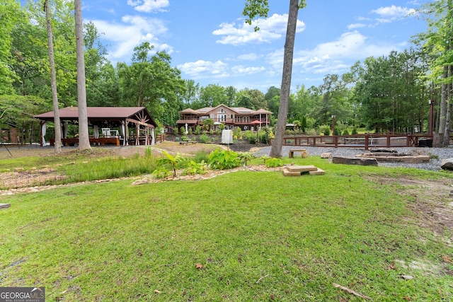 1572 Azalea Dr, Lawrenceville, GA 30043 - view of yard with a gazebo, a garden, and view of scattered trees