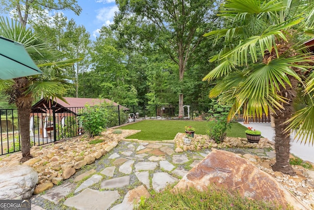 1572 Azalea Dr, Lawrenceville, GA 30043 - fenced backyard featuring a patio