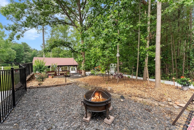 1572 Azalea Dr, Lawrenceville, GA 30043 - view of yard with an outdoor fire pit