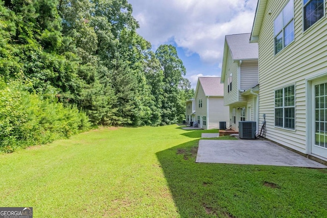 513 Shadow Valley Ct, Lithonia, GA 30058 - view of grassy yard with a patio area
