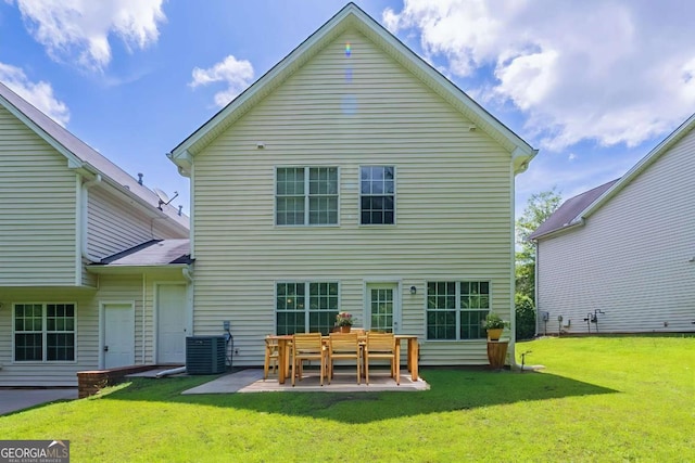513 Shadow Valley Ct, Lithonia, GA 30058 - rear view of house featuring a yard and a patio