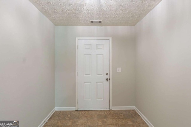513 Shadow Valley Ct, Lithonia, GA 30058 - doorway to outside featuring baseboards