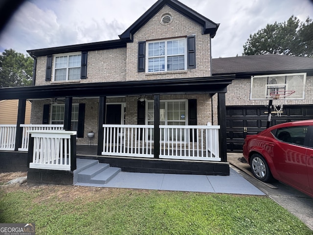 595 Castlebrooke Dr, Lawrenceville, GA 30045 - view of front of home featuring covered porch and brick siding