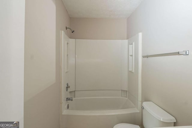 5207 Shawn Ln, Stone Mountain, GA 30088 - full bathroom with shower / tub combination and a textured ceiling