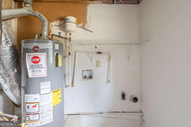 5207 Shawn Ln, Stone Mountain, GA 30088 - utility room featuring gas water heater