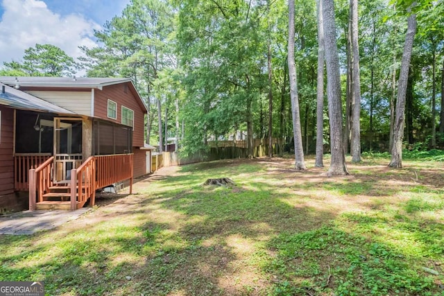 5207 Shawn Ln, Stone Mountain, GA 30088 - view of yard with a sunroom