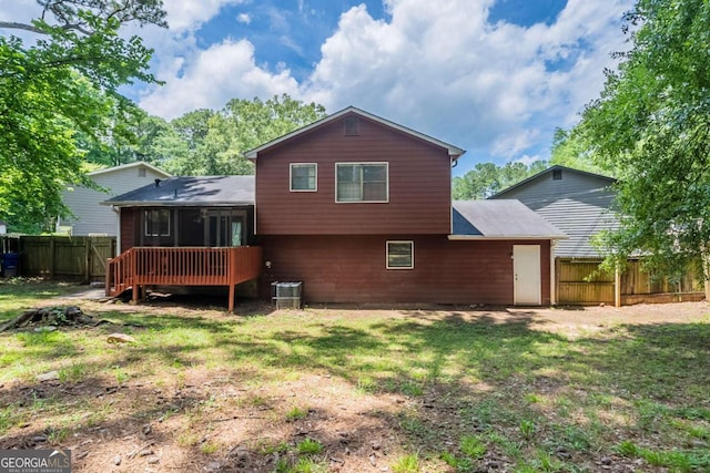 5207 Shawn Ln, Stone Mountain, GA 30088 - rear view of property featuring a sunroom
