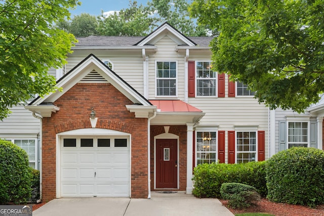 13495 Spring View Dr, Alpharetta, GA 30004 - view of front facade featuring driveway and brick siding