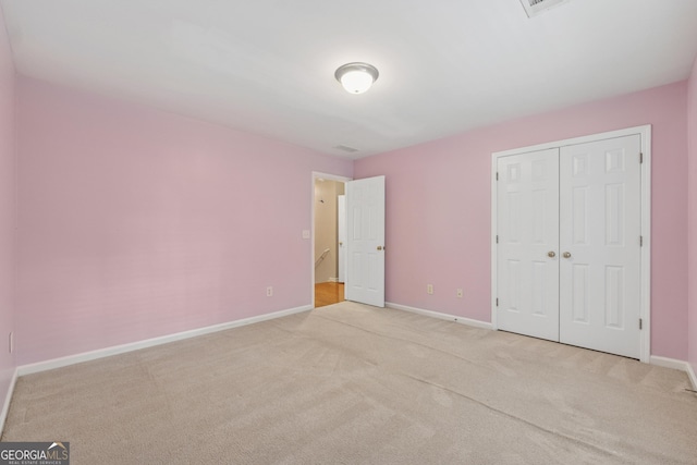 13495 Spring View Dr, Alpharetta, GA 30004 - unfurnished bedroom featuring carpet flooring and a closet