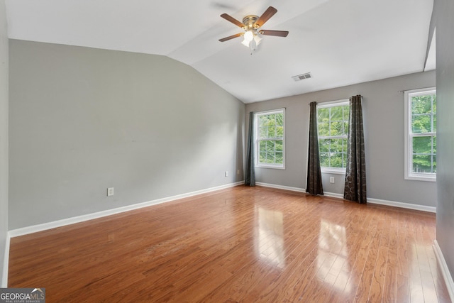 13495 Spring View Dr, Alpharetta, GA 30004 - spare room with vaulted ceiling, ceiling fan, and light wood-style floors