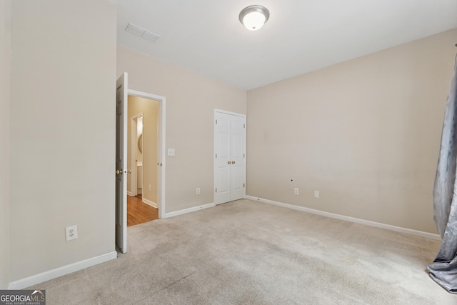 13495 Spring View Dr, Alpharetta, GA 30004 - unfurnished bedroom featuring carpet flooring and baseboards