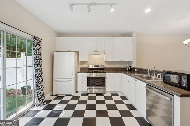 13495 Spring View Dr, Alpharetta, GA 30004 - kitchen with stainless steel appliances, dark floors, dark countertops, under cabinet range hood, and white cabinets