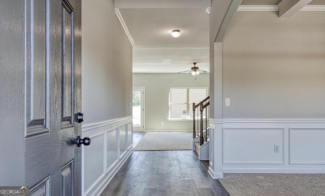 1172 Faulkner Way, Jonesboro, GA 30238 - foyer entrance featuring ornamental molding, stairs, a ceiling fan, wood finished floors, and a decorative wall