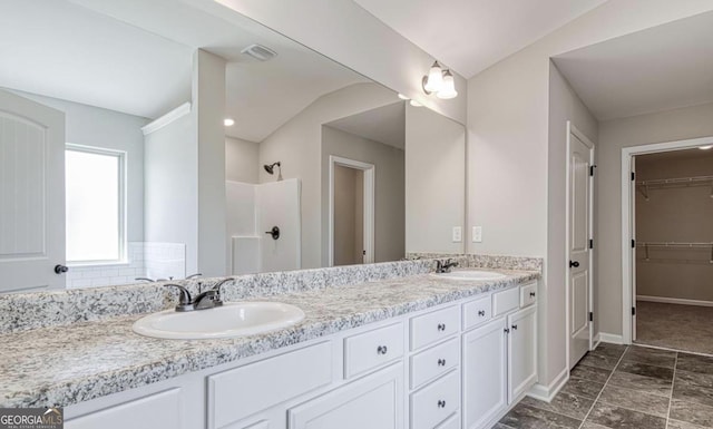 1172 Faulkner Way, Jonesboro, GA 30238 - full bathroom with double vanity, a shower, and a walk in closet