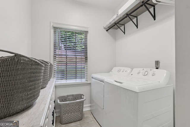 2009 Mclain Rd NW, Acworth, GA 30101 - laundry area featuring washing machine and dryer and light tile patterned flooring